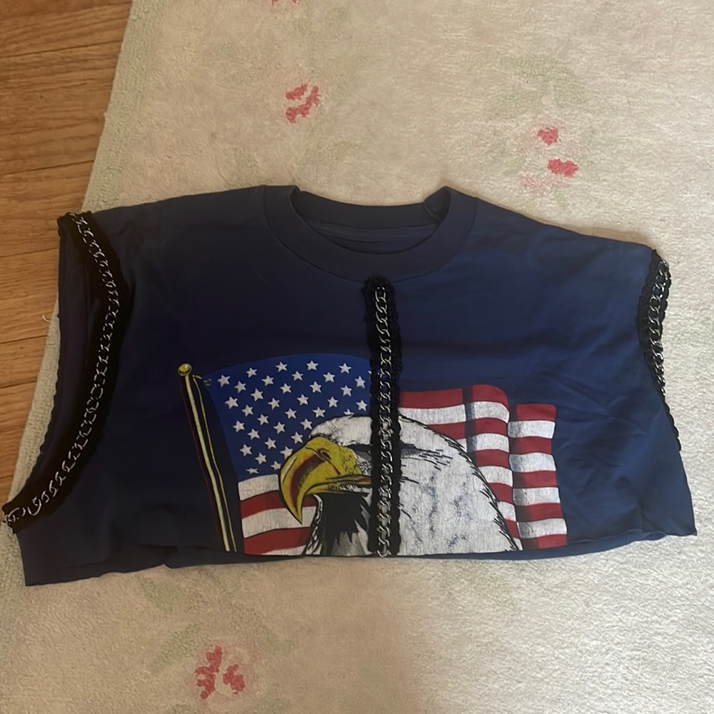 LF navy blue crop top with American flag, an eagle, and chain details